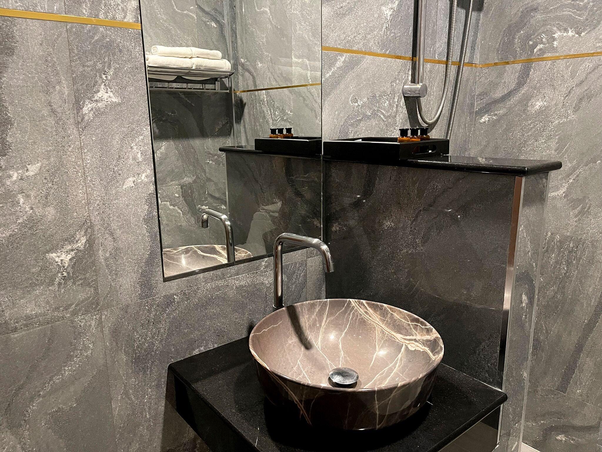 Grey-marble vessel sink